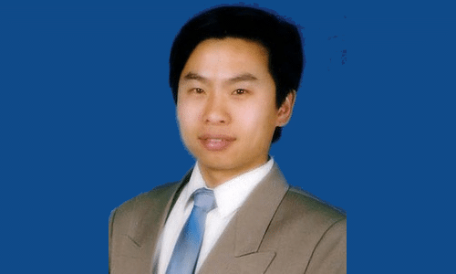 Mr. Lu Kaili before the persecution began.