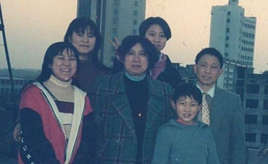 Full family photo of the Wang's in China, 1994. Pictured left to right are the two oldest daughters, mother Mrs. Aihua Liu, daughter Lydia Wang, son Steven Wang and father Mr. Guanghui Wang.