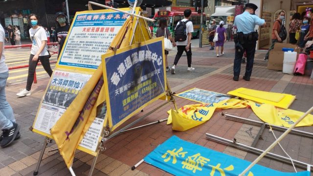 December 2020: Hong Kong booths in tatters, police called on Hu Aimin for assaulting volunteers in Hong Kong.