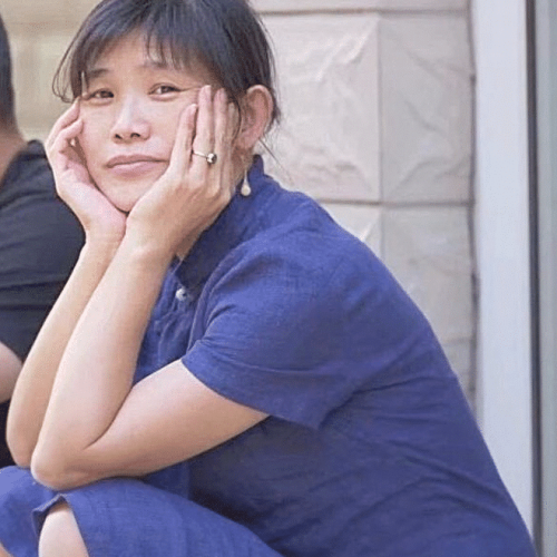 Ms. Xu Na, one of eleven incarcerated citizen journalists who practice Falun Gong.